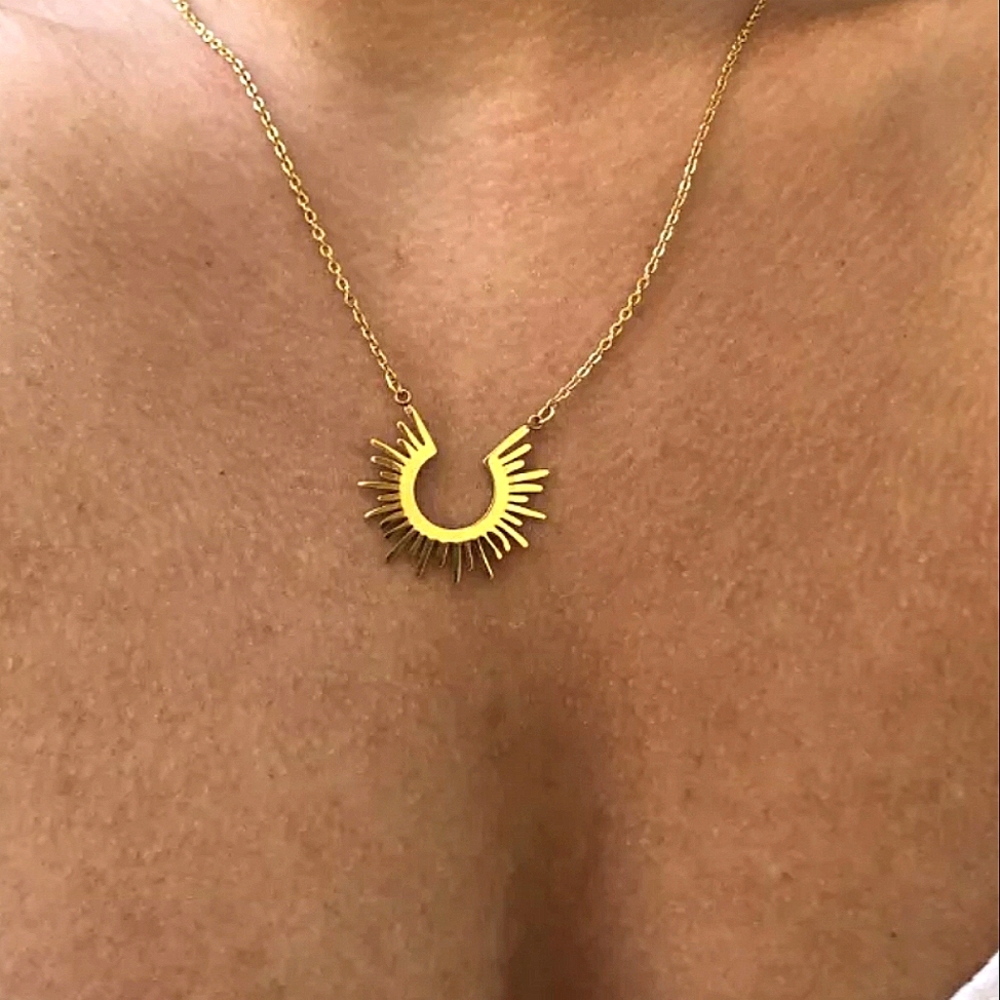Gold plated starburst necklace